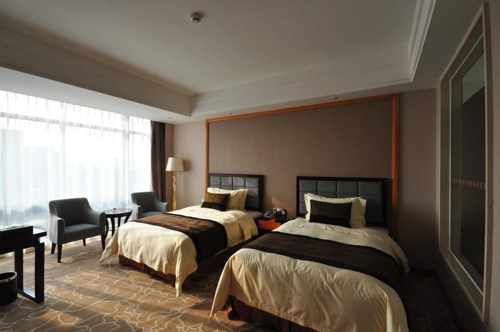Nanhai Jiayi International Hotel Foshan Oda fotoğraf